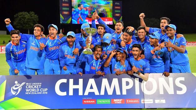India's team poses to celebrate its victory in the Under-19 cricket World Cup final against Australia at Bay Oval in Mount Maunganui on Saturday.(AFP)