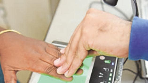 A person giving finger impression at an Aadhaar Card centre in Kolkata.(Mint File)