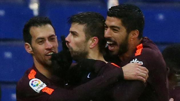 Gerard Pique’s (center) late strike guided FC Barcelona to a 1-1 draw against Espanyol in La Liga. (REUTERS) Gerard Pique’s (center) late strike guided FC Barcelona to a 1-1 draw against Espanyol in La Liga. (REUTERS)