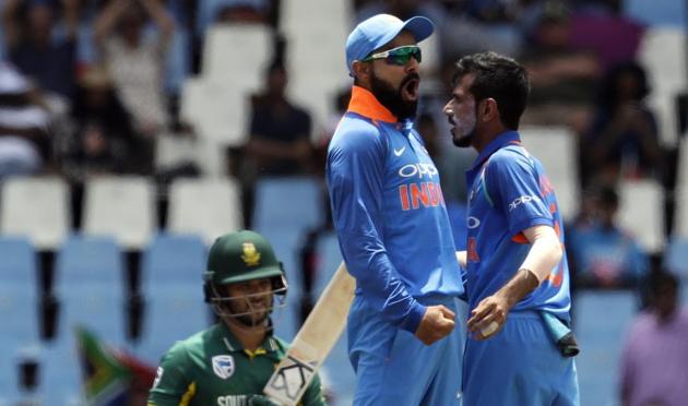 Yuzvendra Chahal (right) celebrates with Indian cricket captain Virat Kohli after dismissing South Africa cricket team's JP Duminy during the second ODI at Centurion Park in Pretoria on Sunday. (AP) Yuzvendra Chahal (right) celebrates with Indian cricket captain Virat Kohli after dismissing South Africa cricket team's JP Duminy during the second ODI at Centurion Park in Pretoria on Sunday. (AP)