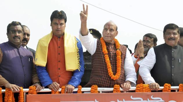 Union home minister Rajnath Singh addresses a gathering an election rally in Agartala on Sunday.(PTI Photo)