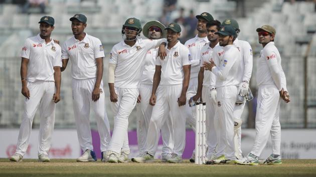 Bangladesh's players wait for the third umpire decision during the fourth day of their first test cricket match against Sri Lanka in Chittagong, Bangladesh, Saturday, Feb. 3, 2018. (AP Photo/A.M. Ahad)(AP)
