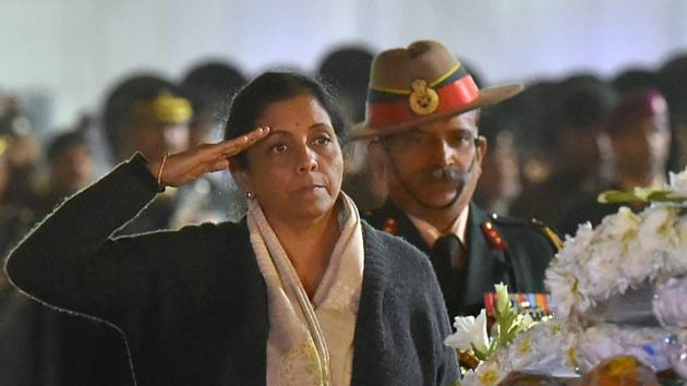 Defence minister Nirmala Sitharaman pays tribute to Captain Kapil Kundu after his mortal remains were brought at AFS Palam in New Delhi on Monday. Captain Kundu was killed along the LoC in Jammu and Kashmir's Rajouri district along with three other soldiers in shelling from Pakistan side.(PTI Photo)