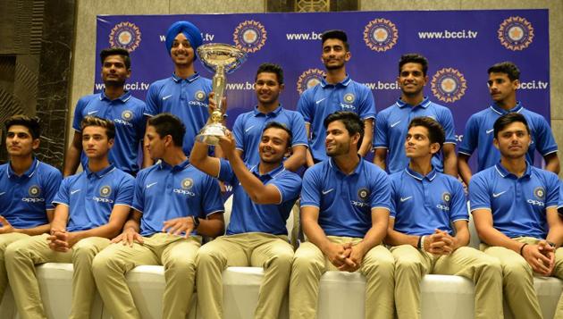 The Indian team pose with the ICC U-19 cricket World Cup trophy in Mumbai on Monday. (AFP) The Indian team pose with the ICC U-19 cricket World Cup trophy in Mumbai on Monday. (AFP)