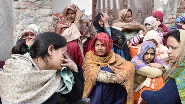 Relatives of Captain Kapil Kundu, one of the four soldiers killed in Pakistan shelling in Rajouri, mourn for him in his family’s village near Pataudi in Haryana. (Sanjeev Verma/HT Photo) Relatives of Captain Kapil Kundu, one of the four soldiers killed in Pakistan shelling in Rajouri, mourn for him in his family’s village near Pataudi in Haryana. (Sanjeev Verma/HT Photo)