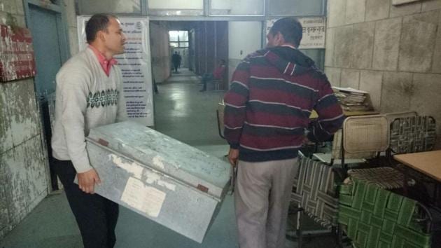 CBI officials carry a trunk with 29 spiral volumes of the chargesheet, which included list of witnesses, forensic reports, fingerprints reports, witness statements, emails exchanged between school principal and management, and evidence which led the CBI to the 16-year-old accused. (Leena Dhankhar/HT Photo) CBI officials carry a trunk with 29 spiral volumes of the chargesheet, which included list of witnesses, forensic reports, fingerprints reports, witness statements, emails exchanged between school principal and management, and evidence which led the CBI to the 16-year-old accused. (Leena Dhankhar/HT Photo)
