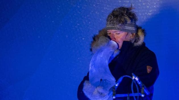 Terje Lsungset, the founder and artistic director of the Ice Music Festival, performs with a musical instrument made purely of ice.(AFP) Terje Lsungset, the founder and artistic director of the Ice Music Festival, performs with a musical instrument made purely of ice.(AFP)