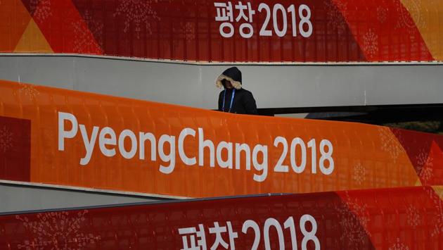 A man walks up the ramp outside the Gangneung Curling Center at the Olympic Park. A 101-day torch relay ahead of the games began in Greece on October 24, 2017 and will end at the venue on February 09, 2018. (Jae C. Hong / AP) A man walks up the ramp outside the Gangneung Curling Center at the Olympic Park. A 101-day torch relay ahead of the games began in Greece on October 24, 2017 and will end at the venue on February 09, 2018. (Jae C. Hong / AP)