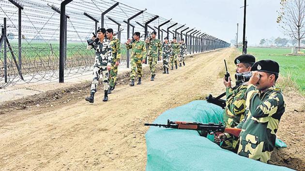 BSF jawans continue their vigil along the International Border in Amritsar. (HT File Photo)