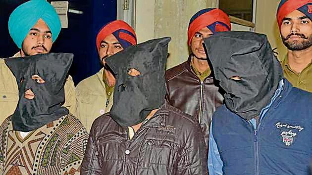 The three accused in police custody in Ludhiana on Monday. (Gurpreet Singh/HT) The three accused in police custody in Ludhiana on Monday. (Gurpreet Singh/HT)