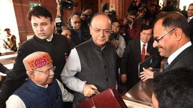 Finance Minister Arun Jaitley holds his briefcase as he arrives at the parliament to present the general budget in New Delhi on February 1, 2018. (Arvind Yadav/HT Photo) Finance Minister Arun Jaitley holds his briefcase as he arrives at the parliament to present the general budget in New Delhi on February 1, 2018. (Arvind Yadav/HT Photo)