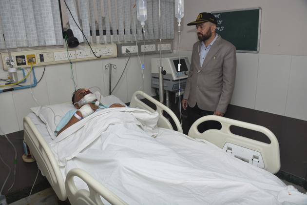 40-year-old Pawan Sharma was rushed to a hospital in Mohan Nagar from where he was taken to the Yashoda Hospital in Ghaziabad. (Sakib Ali/HT Photo) 40-year-old Pawan Sharma was rushed to a hospital in Mohan Nagar from where he was taken to the Yashoda Hospital in Ghaziabad. (Sakib Ali/HT Photo)