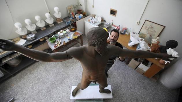 A certified reproduction can take days to complete, with this mid-5th century B.C. Zeus, or Poseidon, requiring nearly two months from beginning to end, including the time the plaster took to dry. Copies of this scale sit near the top of the price range, costing 3000 euros (approx. Rs 2,40,000). (Thanassis Stavrakis / AP) A certified reproduction can take days to complete, with this mid-5th century B.C. Zeus, or Poseidon, requiring nearly two months from beginning to end, including the time the plaster took to dry. Copies of this scale sit near the top of the price range, costing 3000 euros (approx. Rs 2,40,000). (Thanassis Stavrakis / AP)