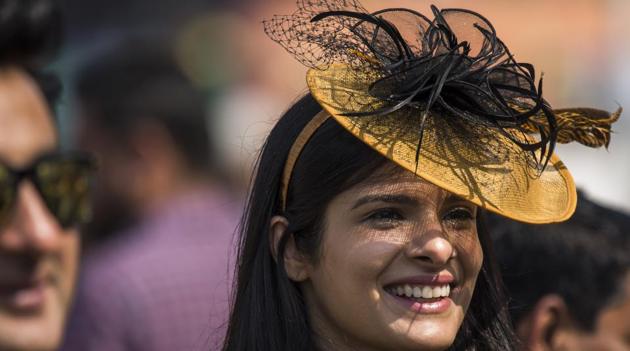 A young woman flaunts a dramatic hat at Mahalaxmi racecourse in Mumbai where the Indian Derby 2018 was held on Sunday, February 4. (Pratik Chorge / HT Photo)