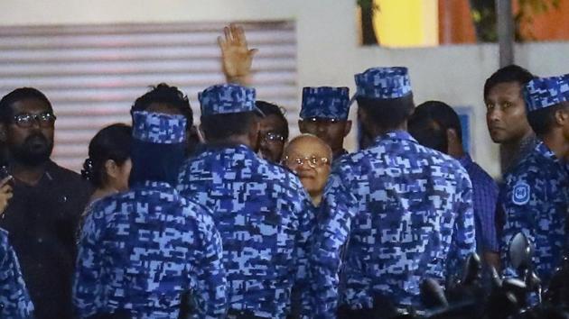 Policemen arrest former Maldives president and opposition leader Maumoon Abdul Gayoom, centre, after the government declared a 15-day state of emergency in Male, Maldives, on Tuesday, Feb. 6, 2018.(AP Photo)