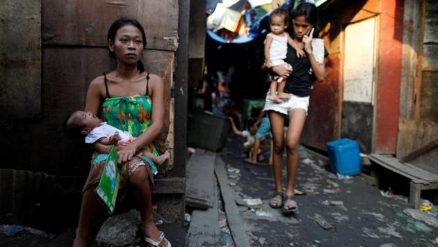 Photos Night In Philippine Slum Revives Spectre Of Dutertes Drug War