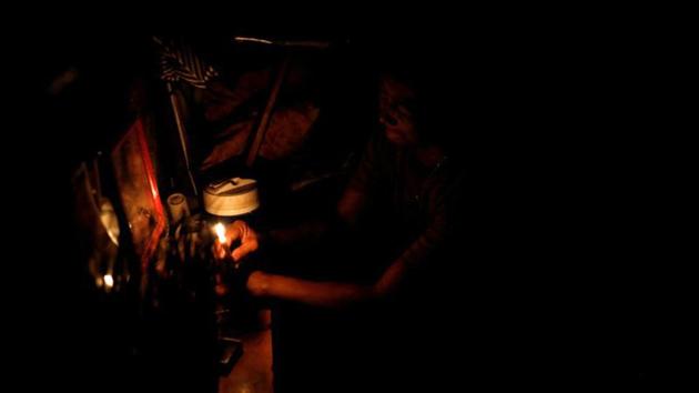A woman lights candles at a shrine in front of a picture of her 23-year-old son, who was killed during an anti-drug operation, inside her shanty. “We can’t really count them anymore,” Nenita Bravo, a 56-year-old resident told Reuters, referring to those killed, adding that she had witnessed many killings in the area. “We can’t really count them because there’s been so many.” (Dondi Tawatao / REUTERS) A woman lights candles at a shrine in front of a picture of her 23-year-old son, who was killed during an anti-drug operation, inside her shanty. “We can’t really count them anymore,” Nenita Bravo, a 56-year-old resident told Reuters, referring to those killed, adding that she had witnessed many killings in the area. “We can’t really count them because there’s been so many.” (Dondi Tawatao / REUTERS)