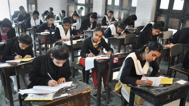 Students appear in the Class 12 examination of Uttar Pradesh Board at an examination centre in Moradabad on Tuesday. (PTI) Students appear in the Class 12 examination of Uttar Pradesh Board at an examination centre in Moradabad on Tuesday. (PTI)