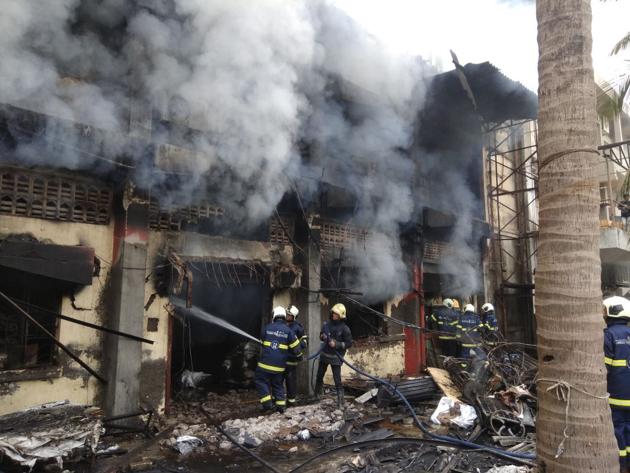 Firemen try to douse the flames at the cloth mill, which caught fire on Wednesday morning. (Satyabrata Tripathy) Firemen try to douse the flames at the cloth mill, which caught fire on Wednesday morning. (Satyabrata Tripathy)