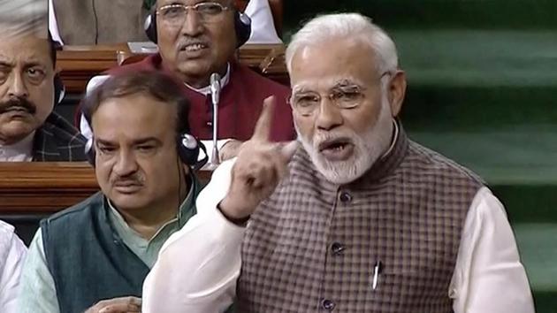 Prime Minister Narendra Modi speaks in Lok Sabha on Wednesday.(PTI/TV grab)