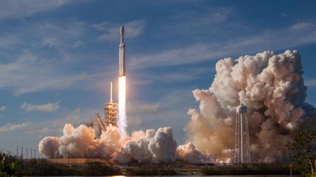 The 230-foot tall rocket is designed to carry nearly 64 metric tonnes into orbit -- more than the mass of a fully loaded 737 jetliner. It was initially intended to restore the possibility of sending humans to the Moon or Mars, but those plans have shifted and now the Falcon Heavy is being considered mainly as a potential equipment carrier to these deep space destinations, Musk said Monday. (SpaceX / REUTERS) 
