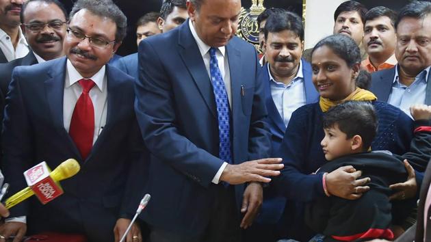The five-year-old child (extreme right), who was abducted from his school bus a day before Republic Day in Delhi, with his mother after being rescued by Delhi Police, at a press conference in New Delhi on Tuesday. (PTI Photo) The five-year-old child (extreme right), who was abducted from his school bus a day before Republic Day in Delhi, with his mother after being rescued by Delhi Police, at a press conference in New Delhi on Tuesday. (PTI Photo)