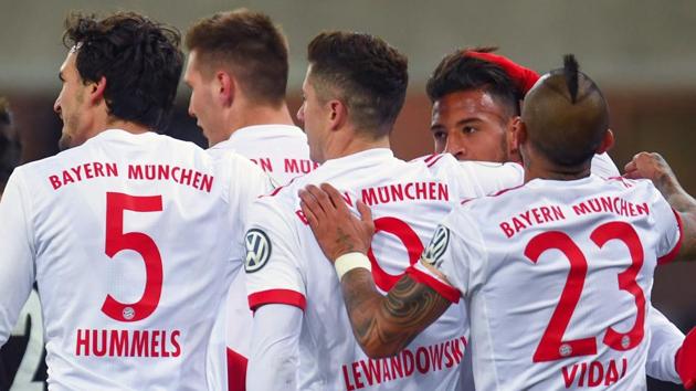 Bayern Munich's French midfielder Corentin Tolisso (2ndR) is congratulated by teammates after scoring during the German football Cup DFB Pokal quarter-final match SC Paderborn versus Bayern Munich on February 6, 2018 in Paderborn. Bayern Munich won 6-0. (AFP) Bayern Munich's French midfielder Corentin Tolisso (2ndR) is congratulated by teammates after scoring during the German football Cup DFB Pokal quarter-final match SC Paderborn versus Bayern Munich on February 6, 2018 in Paderborn. Bayern Munich won 6-0. (AFP)