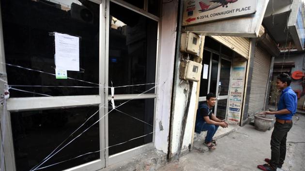 A sealed office in N- Block, Connaught Place, on Wednesday.(Sonu Mehta/HT PHOTO)