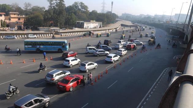 Although Gurgaon traffic police has installed cones at Rajiv Chowk intersection to streamline traffic, commuters say they add to the confusion on the road. (Parveen Kumar/HT Photo) Although Gurgaon traffic police has installed cones at Rajiv Chowk intersection to streamline traffic, commuters say they add to the confusion on the road. (Parveen Kumar/HT Photo)