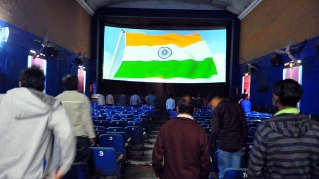 Cinema-goers stand for national anthem before a movie. (Shankar Mourya/HT File Photo) Cinema-goers stand for national anthem before a movie. (Shankar Mourya/HT File Photo)