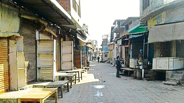 A deserted market amid a bandh call in protest over the murders in Dera Baba Nanak in Gurdaspur district on Wednesday. (HT Photo) A deserted market amid a bandh call in protest over the murders in Dera Baba Nanak in Gurdaspur district on Wednesday. (HT Photo)