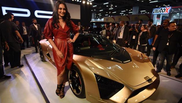 Bollywood actor Sonakshi Sinha poses with the DC sports car after it was unveiled at Auto Expo 2018. (Burhaan Kinu / HT Photo) Bollywood actor Sonakshi Sinha poses with the DC sports car after it was unveiled at Auto Expo 2018. (Burhaan Kinu / HT Photo)