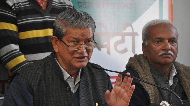 Former chief minister Harish Rawat (left) accused BJP of fanning communal tensions in the name of cow protection.(HT Photo)