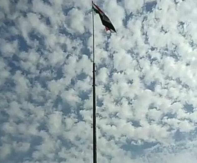 The tricolour was unfurled by Chandan’s father Sushil Gupta atop a 50 feet tall metallic pole. (HT Photo) The tricolour was unfurled by Chandan’s father Sushil Gupta atop a 50 feet tall metallic pole. (HT Photo)