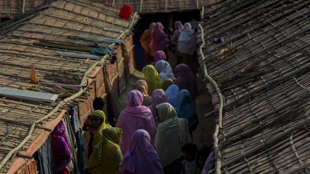 This photograph taken on January 26, 2018 shows women walking inside the "widow's camp" at the Balukhali refugee camp in Bangladesh's Ukhia district.(AFP Photo) This photograph taken on January 26, 2018 shows women walking inside the "widow's camp" at the Balukhali refugee camp in Bangladesh's Ukhia district.(AFP Photo)