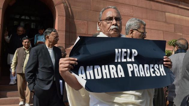 Congress leader KVP Ramachandra Rao holding a placard during a protest demanding ‘Help for Andhra Pradesh’ at Parliament House during the Budget Session in New Delhi on February 2. (PTI File Photo) Congress leader KVP Ramachandra Rao holding a placard during a protest demanding ‘Help for Andhra Pradesh’ at Parliament House during the Budget Session in New Delhi on February 2. (PTI File Photo)