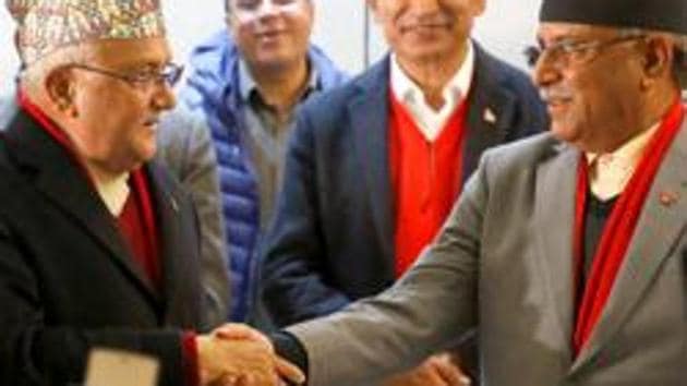 File photo of Communist Party of Nepal-Unified Marxist-Leninist chairman KP Sharma Oli shaking hands with the chairman of the Communist Party of Nepal-Maoist Centre Pushpa Kamal Dahal “Prachanda” during a news conference in Kathmandu on December 17, 2017. (Reuters) File photo of Communist Party of Nepal-Unified Marxist-Leninist chairman KP Sharma Oli shaking hands with the chairman of the Communist Party of Nepal-Maoist Centre Pushpa Kamal Dahal “Prachanda” during a news conference in Kathmandu on December 17, 2017. (Reuters)