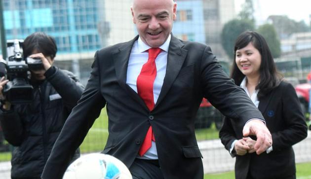 FIFA president Gianni Infantino (C) kicks a football in front of the media during a visit to the Vietnam Football Federation in Hanoi on Thursday. (AFP) FIFA president Gianni Infantino (C) kicks a football in front of the media during a visit to the Vietnam Football Federation in Hanoi on Thursday. (AFP)