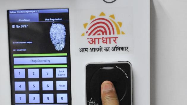 Employees mark their attendance through Aadhaar-based system in the Planning Commission. (HT FIle Photo) Employees mark their attendance through Aadhaar-based system in the Planning Commission. (HT FIle Photo)
