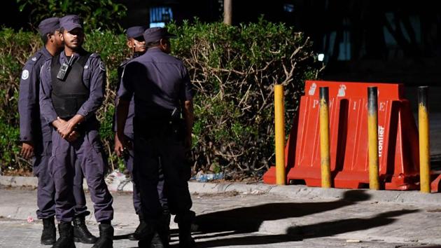 Security forces stand outside Maldivian Democratic Party (MDP) office as they barricade it, in capital Male on February 7, 2018. (AFP) Security forces stand outside Maldivian Democratic Party (MDP) office as they barricade it, in capital Male on February 7, 2018. (AFP)