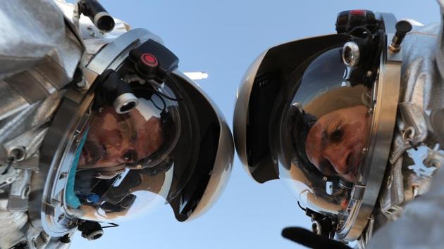 The cutting-edge spacesuit for instance, weighing about 50 kilograms, is a “personal spaceship” because one can breathe, eat and do hard science inside it. The suit’s visor displays maps, communications and sensor data. A blue piece of foam in front of the chin can be used to wipe the nose and mouth. (Karim Sahib / AFP) The cutting-edge spacesuit for instance, weighing about 50 kilograms, is a “personal spaceship” because one can breathe, eat and do hard science inside it. The suit’s visor displays maps, communications and sensor data. A blue piece of foam in front of the chin can be used to wipe the nose and mouth. (Karim Sahib / AFP)