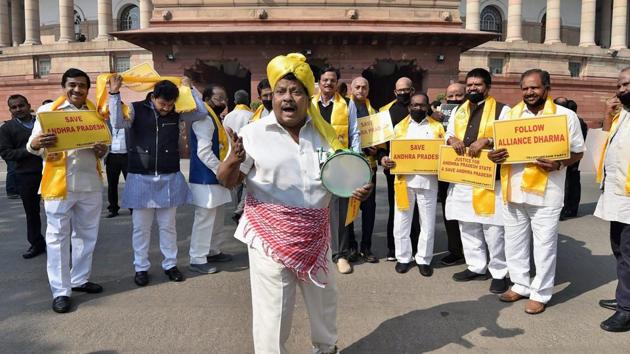 TDP MP from Chittoor N Sivaprasad along with other members from Andhra Pradesh, at a protest demanding special package for the state, during the budget session of Parliament in New Delhi on February 8. (PTI Photo) TDP MP from Chittoor N Sivaprasad along with other members from Andhra Pradesh, at a protest demanding special package for the state, during the budget session of Parliament in New Delhi on February 8. (PTI Photo)