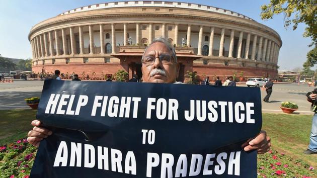 YSRCP member KV Ramchandra Rao displays a placard while staging a protest for Andhra Pradesh at Parliament House in New Delhi on Wednesday during the budget session. A statewide day-long shutdown called on Thursday by opposition parties and indirectly supported by the ruling Telugu Desam Party in Andhra Pradesh to protest the “raw deal” meted out to the state in the Union budget evoked a huge response. (Kamal Kishore / PTI) YSRCP member KV Ramchandra Rao displays a placard while staging a protest for Andhra Pradesh at Parliament House in New Delhi on Wednesday during the budget session. A statewide day-long shutdown called on Thursday by opposition parties and indirectly supported by the ruling Telugu Desam Party in Andhra Pradesh to protest the “raw deal” meted out to the state in the Union budget evoked a huge response. (Kamal Kishore / PTI)