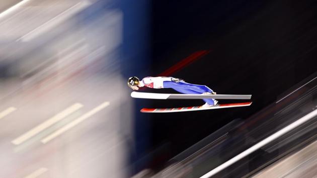 Karl Geiger of Germany competes in the first round of ski jumping. (REUTERS) Karl Geiger of Germany competes in the first round of ski jumping. (REUTERS)