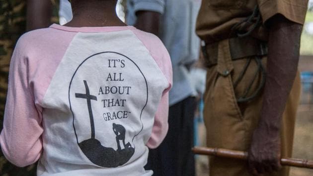 A former child soldier (L) stands next to her former army commander during the ceremony. Special attention will be given to the young women and girls, who are likely to have suffered sexual abuse, so that they can rejoin their communities without stigma. “We are particularly concerned about a number of the girls being released who have experienced sexual or gender-based violence,” said Mesfin Loha, national director of World Vision South Sudan. (Stefanie Glinski / AFP) A former child soldier (L) stands next to her former army commander during the ceremony. Special attention will be given to the young women and girls, who are likely to have suffered sexual abuse, so that they can rejoin their communities without stigma. “We are particularly concerned about a number of the girls being released who have experienced sexual or gender-based violence,” said Mesfin Loha, national director of World Vision South Sudan. (Stefanie Glinski / AFP)