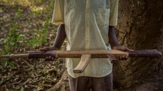 An 11-year-old former child soldier poses with his handmade rifle.“This is a crucial step in achieving our ultimate goal of having all of the thousands of children still in the ranks of armed groups reunited with their families,” said Mahimbo Mdoe, South Sudan representative for UNICEF. The rehabilitation process had been stalled for the past three years. (Stefanie Glinski / AFP) An 11-year-old former child soldier poses with his handmade rifle.“This is a crucial step in achieving our ultimate goal of having all of the thousands of children still in the ranks of armed groups reunited with their families,” said Mahimbo Mdoe, South Sudan representative for UNICEF. The rehabilitation process had been stalled for the past three years. (Stefanie Glinski / AFP)