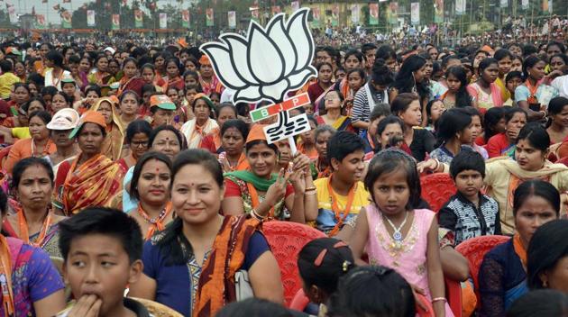 BJP supporters during PM Narendra Modi's election campaign rally ahead of Tripura Assembly Elections in Unakoti on Thursday. Modi called for change, saying poll-bound Tripura no longer needed ‘Manik’ but wanted ‘hira’ (highways, i-ways, roadways and airways) at the rally in Sonamura. (PTI) BJP supporters during PM Narendra Modi's election campaign rally ahead of Tripura Assembly Elections in Unakoti on Thursday. Modi called for change, saying poll-bound Tripura no longer needed ‘Manik’ but wanted ‘hira’ (highways, i-ways, roadways and airways) at the rally in Sonamura. (PTI)
