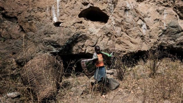 An 11-year-old Pokot girl comes out from an abandoned cave. Cheptilak, recalled how young girls would sometimes die from disease or bleeding after the ceremony. On one occasion, she said, six girls contracted HIV from a dirty blade. “When I recall how the six girls died and the pain these young girls go though, I feel hurt and sorry for them.” (Yasuyoshi Chiba / AFP) 