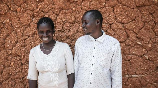 Teko Samuel (R) poses with his wife Chepchumba Damaris, who was not circumcised, during a PERUR meeting. More than 200 million girls and women are estimated to have undergone FGM worldwide and 3 million are at risk each year. February 6, 2018, marked the 6th International Day of Zero Tolerance for Female Genital Mutilation. (Yasuyoshi Chiba / AFP) 