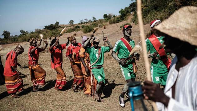 People from the Pokot tribe recreate a circumcision ceremony at their initiation site in Chelel village. 78-year-old healer Jeremia Labur participated in the ceremony seeking forgiveness for performing FGM and child marriage. Fighting tradition with tradition, Pokot spiritual healers and elders have been enlisted to wipe out the practice. (Yasuyoshi Chiba / AFP) 